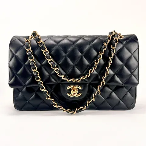 Black quilted Chanel Classic Flap bag with a gold chain strap
