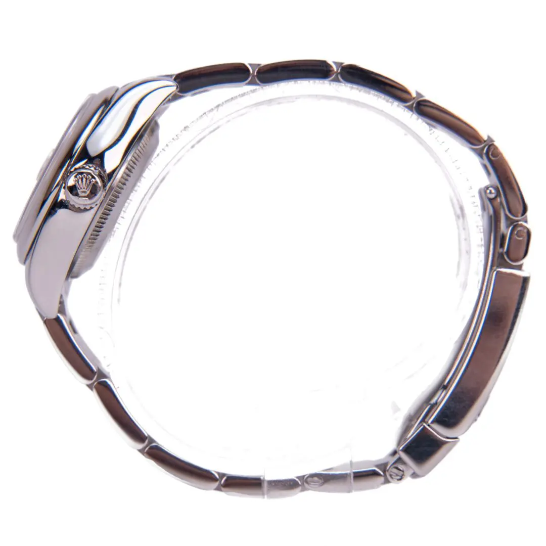 Side view of a silver wristwatch.