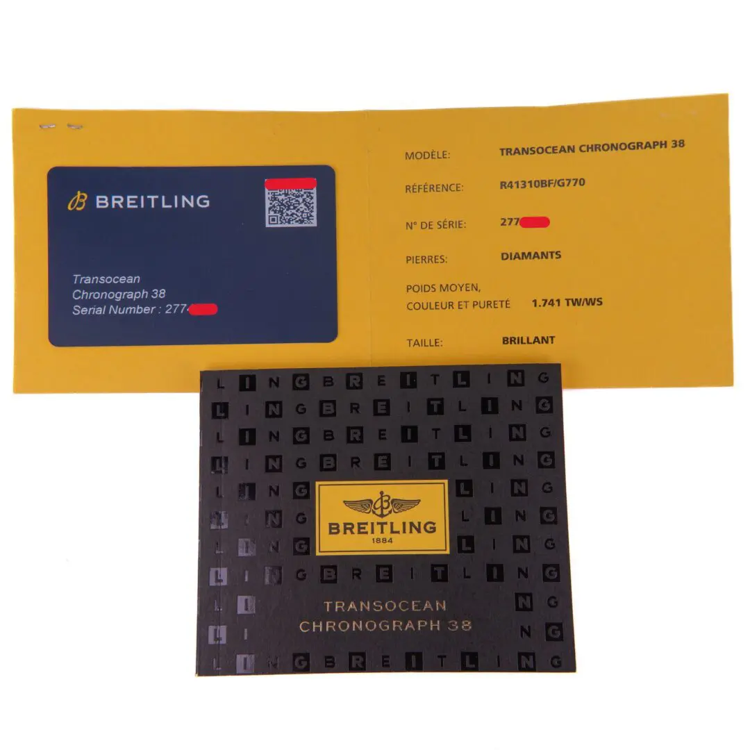 Breitling watch documents and warranty card.