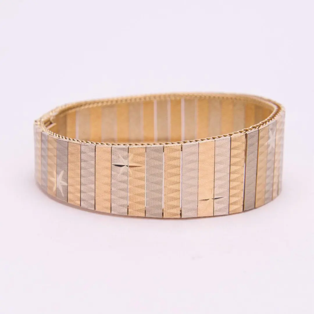Gold and silver striped bracelet.