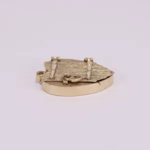 Gold heart-shaped locket on white background.