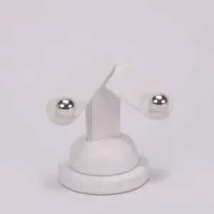 White stand with two adjustable arms.
