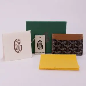 Goyard cardholder with packaging and accessories.