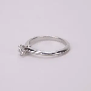 Diamond solitaire engagement ring on display.