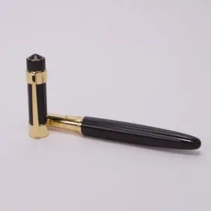 Black and gold pen on display.