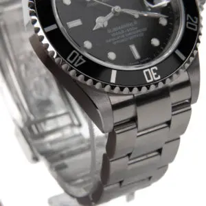 Luxury dive watch with black dial and bezel.