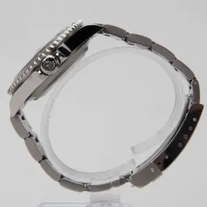 Silver wristwatch with metal link bracelet.