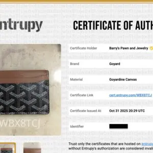 Goyard wallet with authenticity certificate displayed.