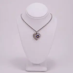 Heart-shaped necklace with evil eye pendant.