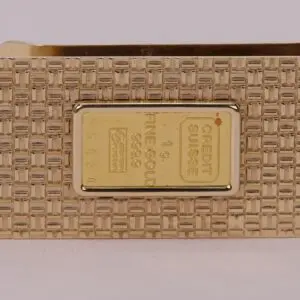 Gold bar with detailed textured surface.
