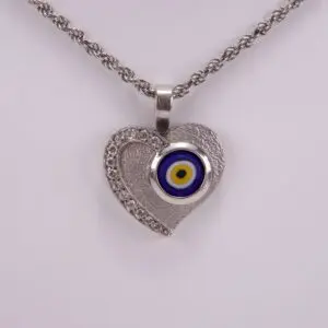 Heart necklace with evil eye pendant.
