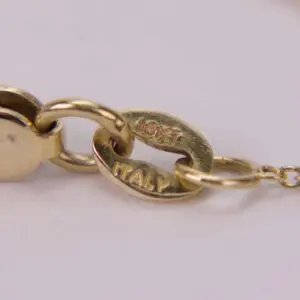 Gold necklace chain stamped 18KT Italy.