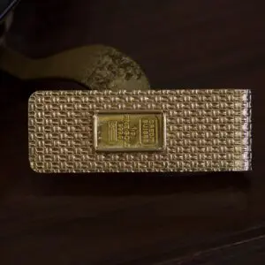 Gold bar design on textured surface.