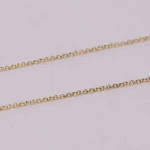 Gold chain on a light background.