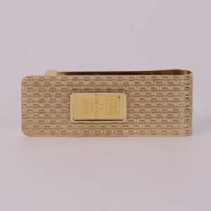 Gold money clip with textured design.