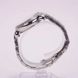 Silver wristwatch with metal bracelet side view.
