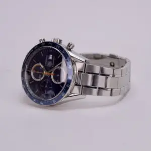 Silver chronograph watch with blue dial.