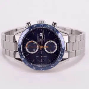 Luxury silver watch with blue dial.