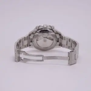 Silver watch with open metal band.