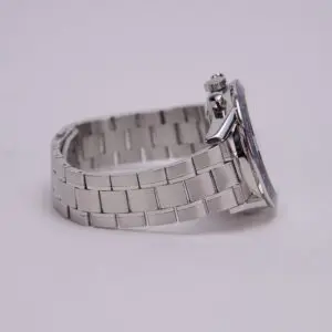 Silver wristwatch with metal band.