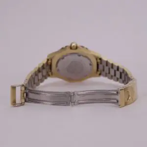 Luxury two-tone wristwatch with metal bracelet.