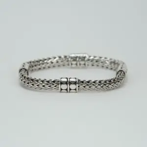 Silver woven bracelet with decorative clasps.