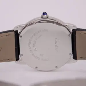Back of a Cartier wristwatch with leather strap.