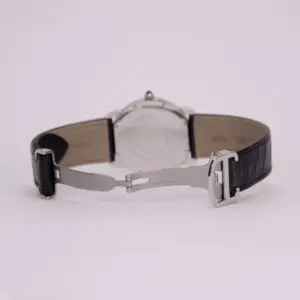 Watch with black leather strap and clasp.