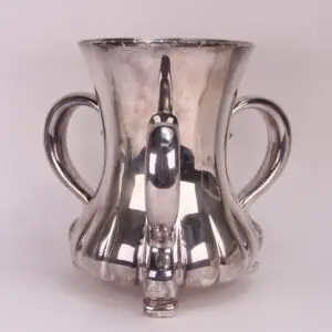 Silver trophy cup with two handles.