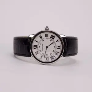 Luxury wristwatch with black leather strap.