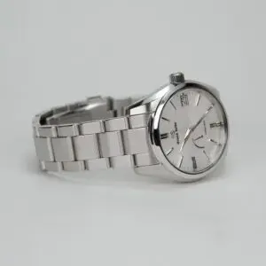 Silver wristwatch with metal bracelet.