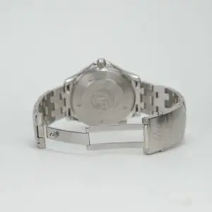 Silver wristwatch with open clasp.