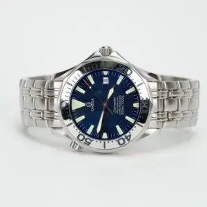 Silver wristwatch with blue dial face.
