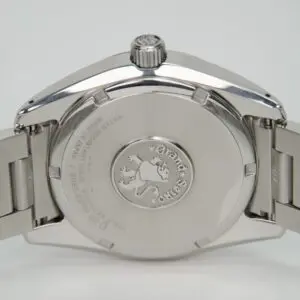 Back of silver wristwatch with engraved logo.