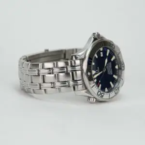 Silver wristwatch with a blue dial.