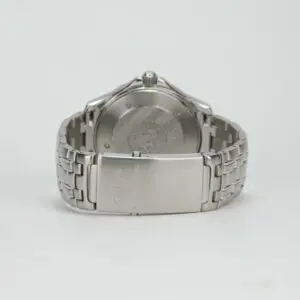 Silver watch with engraved case and bracelet.