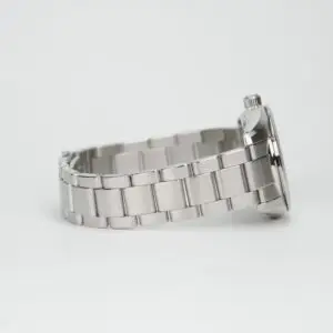 Steel wristwatch with metal link band.