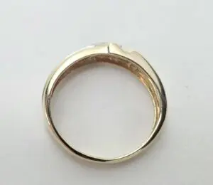 Gold ring with a simple, elegant design.
