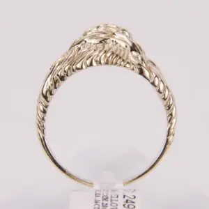 Gold ring with intricate swirling design.