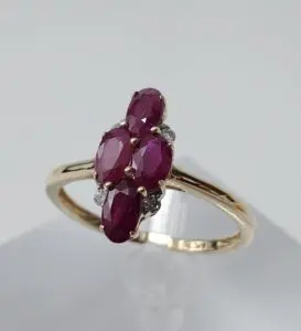 Gold ring with multiple ruby stones.