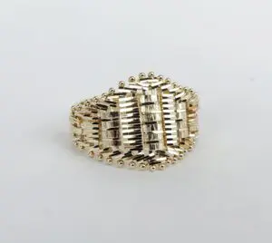 Gold ring with intricate woven design.