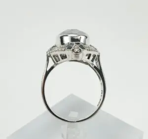 Side view of ornate silver ring setting.