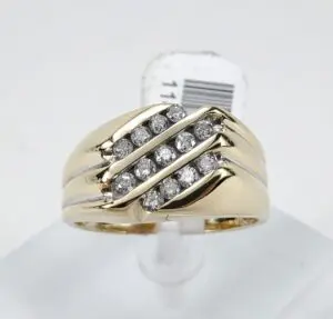 Gold ring with diagonal diamond rows.