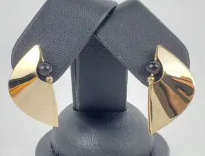 Gold and black modern design earrings.