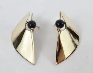Gold abstract earrings with black beads.
