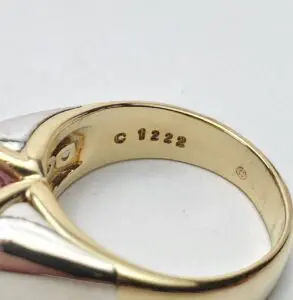 Gold ring with engraved number C 1222.