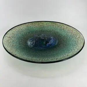 Ceramic bowl with green and blue glaze.