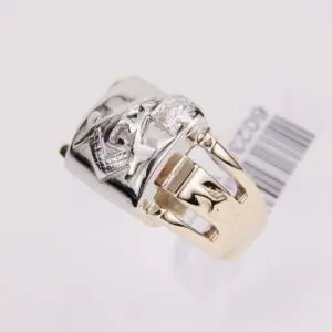 Gold and silver ring with diamond.
