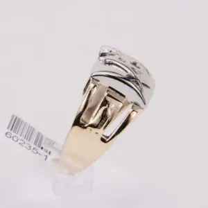 Gold and silver ring with barcode tag.