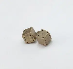 Two metallic dice on a white background.